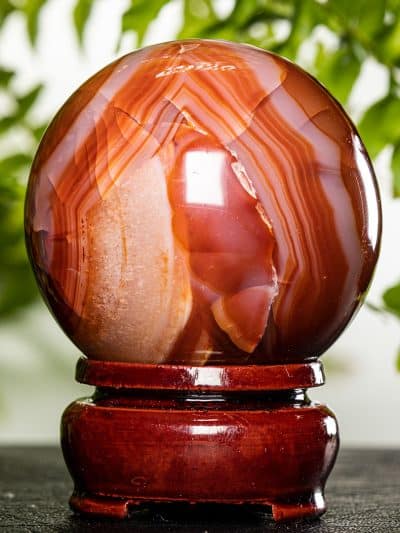 Polished Carnelian Sphere of Courage With Stand