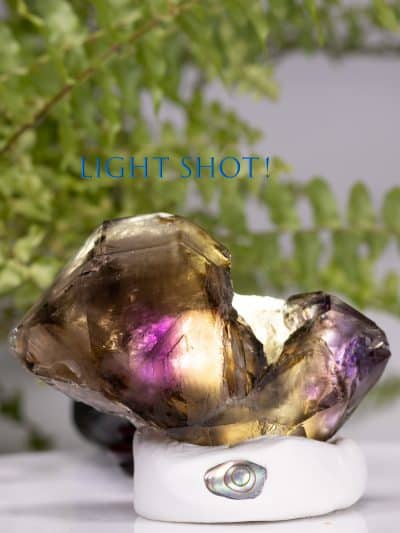 Tricolored Skeletal Elestial double terminated Doorway quartz showing smoky golden purple light shot glow